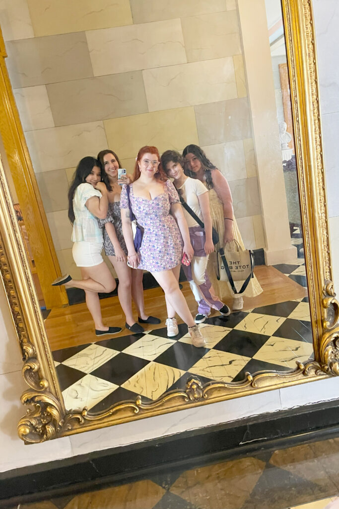 friends smiling on a group trip to nashville