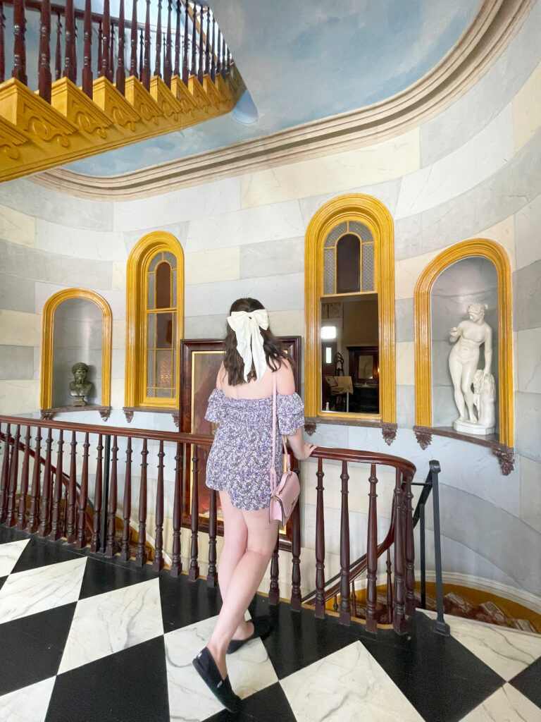full length photo of a girl from behind with bow in her hair in nashville